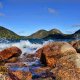 Acadia National Park Jordon Pond rocks with water splashing.