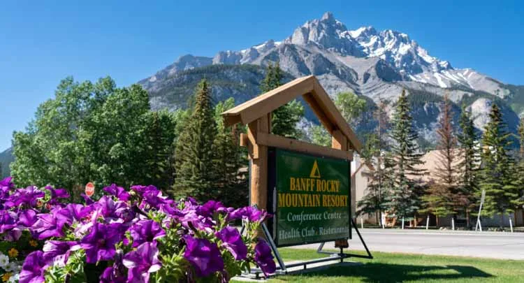 Banff Rocky Mountain Resort banff Rocky Mountain Resort, Canadian Rockies photography of the sign and mountains